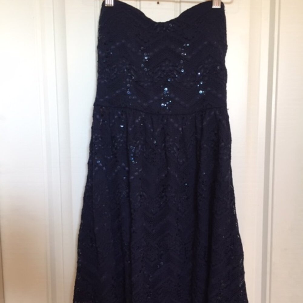 Short sequin dress with flared skirt